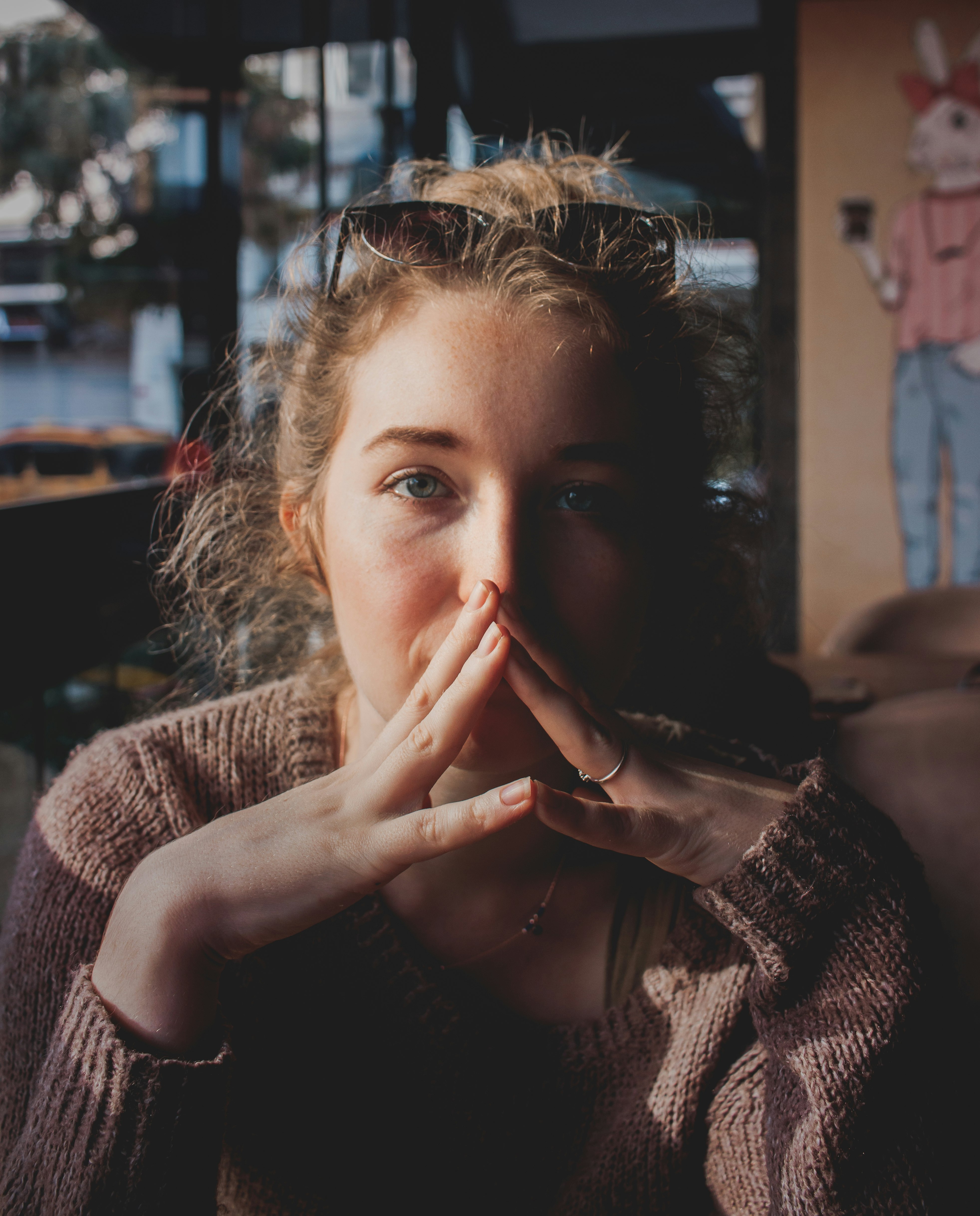 woman in brown knit sweater